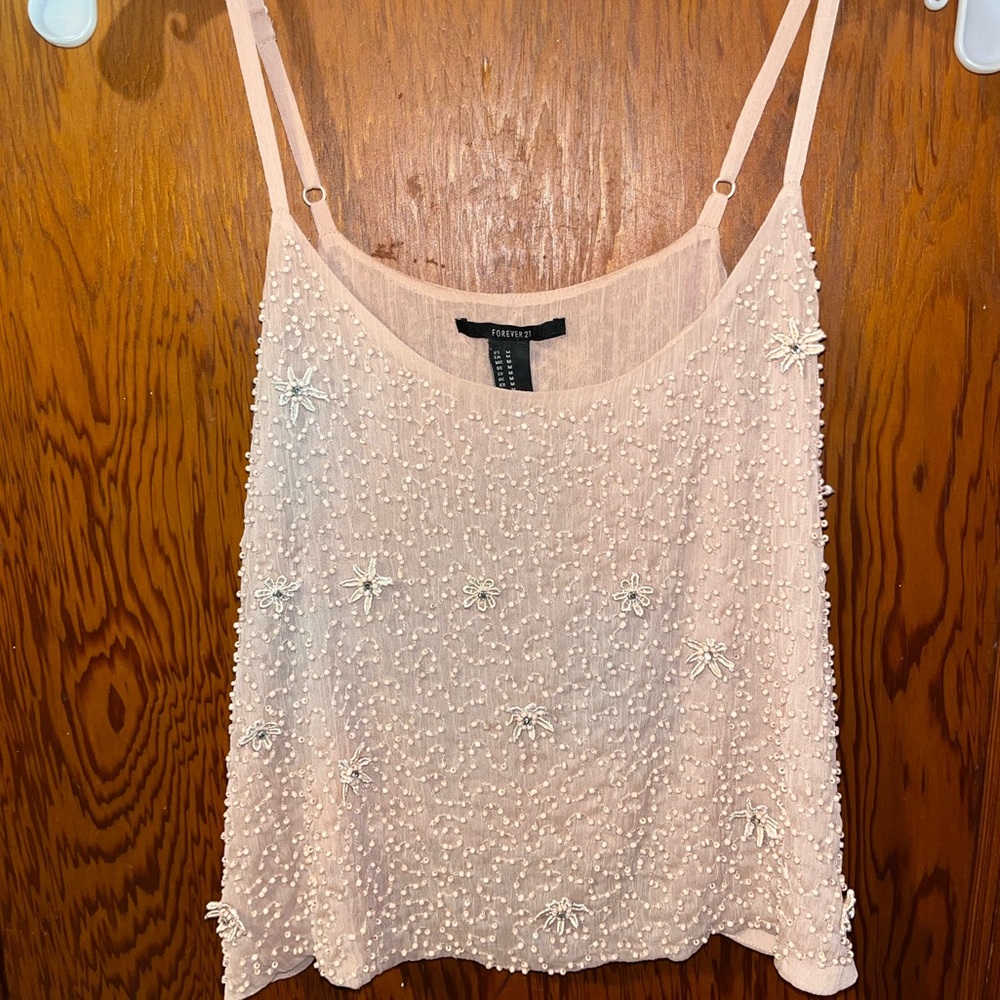 Pink top with beaded detailing